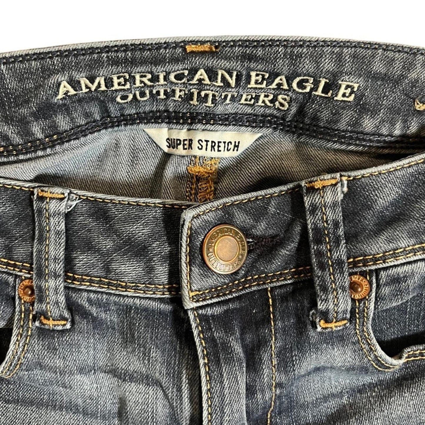 American Eagle Womens Mid Rise Super Skinny 4 Long Jeans Whiskered Front 