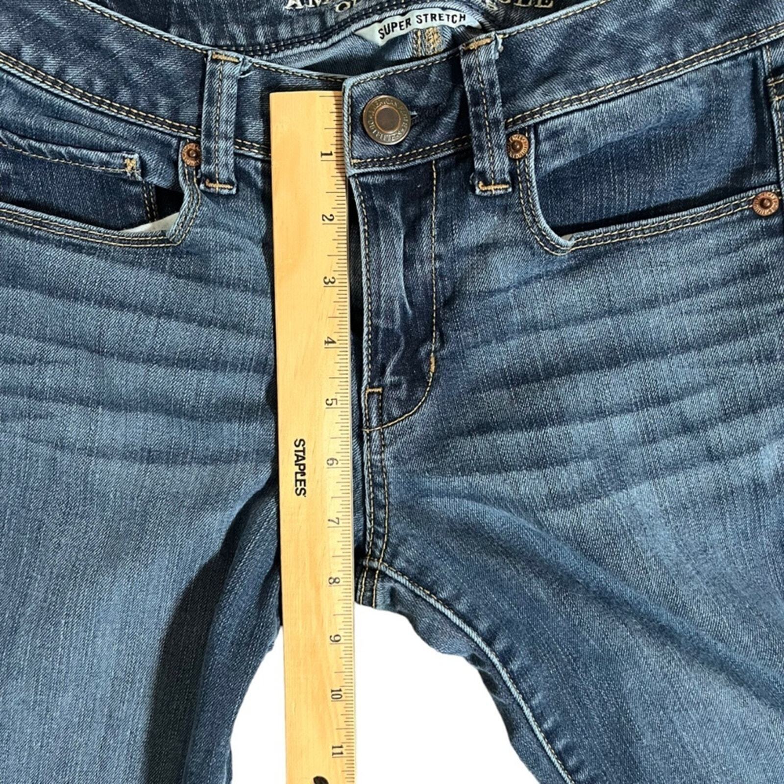 American Eagle Womens Mid Rise Super Skinny 4 Long Jeans Whiskered Front 